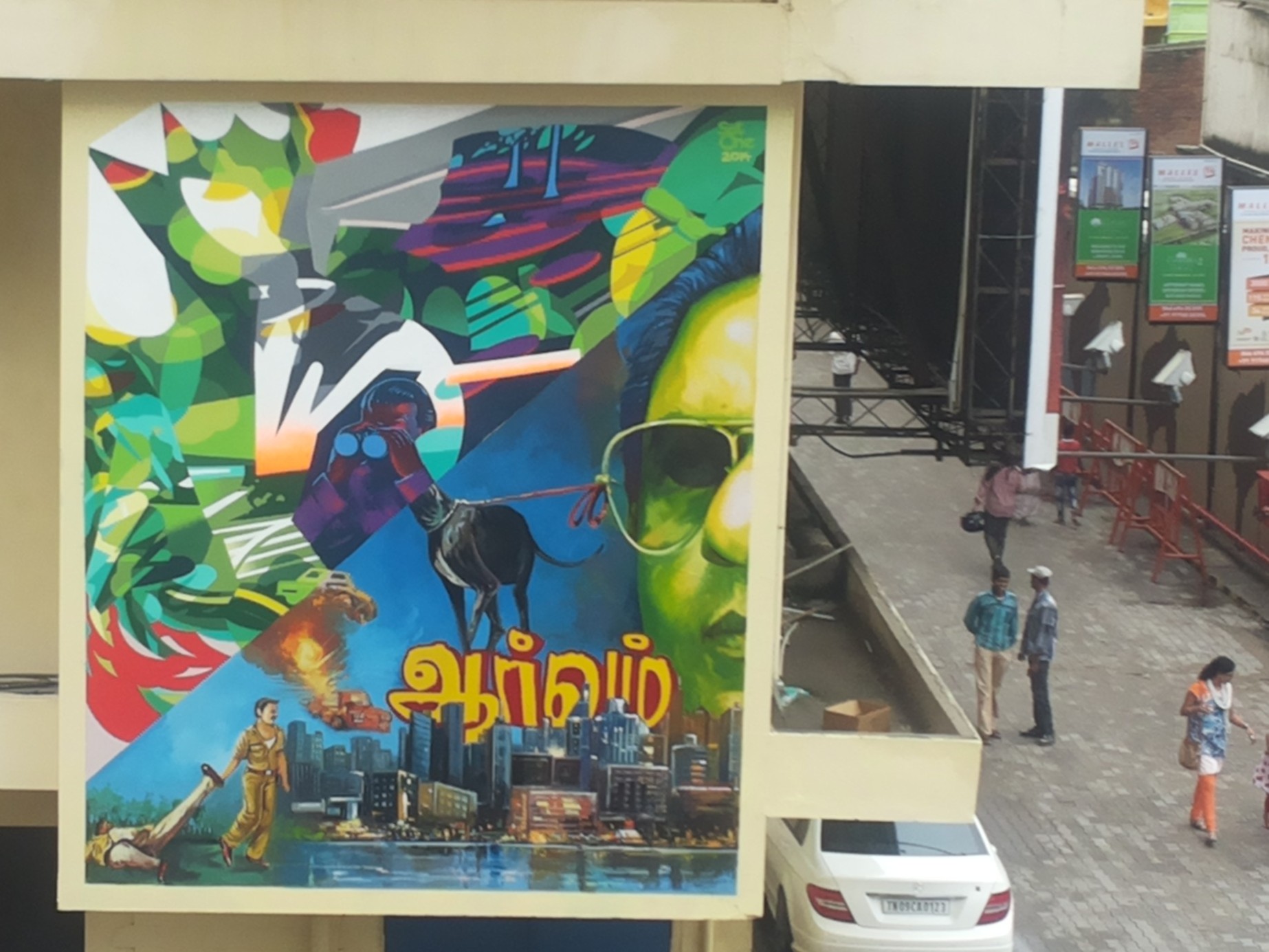 Mural with an abstract part and a part that shows film scenes