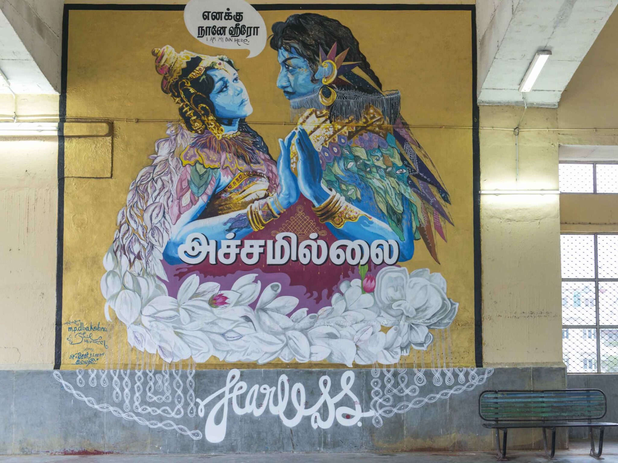 Mural of a dancing couple inside a trainstation